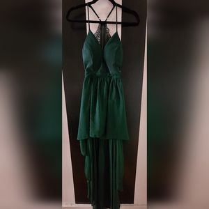 Green asymmetrical dress.